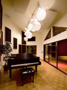 A large iso booth holds Conway's 9-foot Yamaha grand piano.
