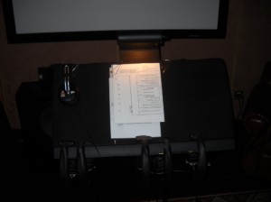 Step up to the mic: Meticulous notes and scripts are at the ready for the actors. 