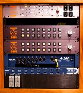 Closeup on the rack with gear from Dangerous and Aviom. 