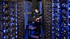 A technician works on one of Google's enormous data centers.
